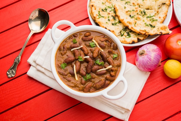 Kidney bean curry or rajma rice or rajmah chawal and roti, typical north indian main course, selective focus