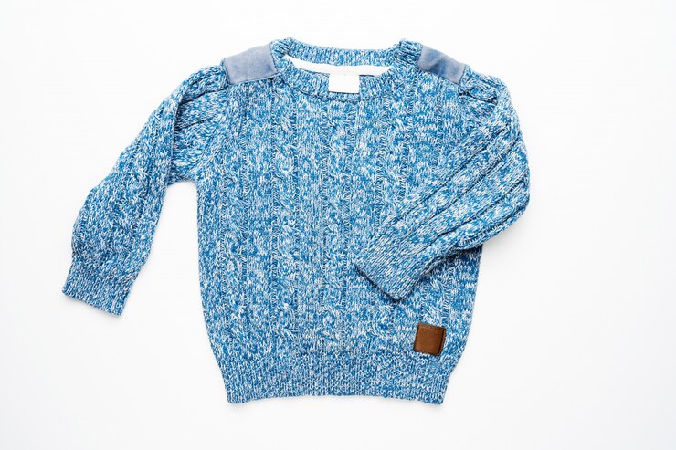 Photo kids blue knitted sweater isolated. front view