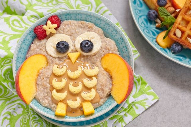 Kids breakfast porridge with fruits