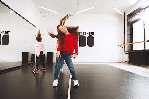 The kids at dance school. Ballet, hiphop, street, funky and modern dancers