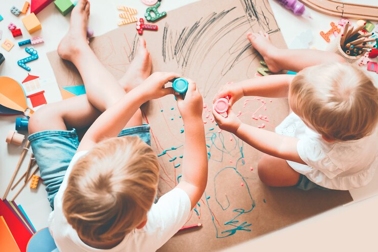 Kids draw and make crafts Children with educational toys and school supplies for creativity