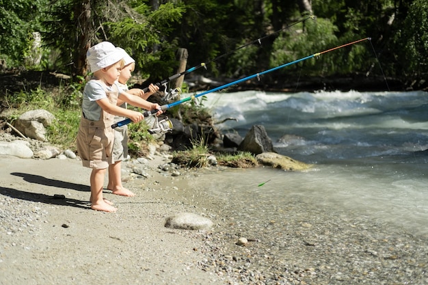 Kids fishing in river