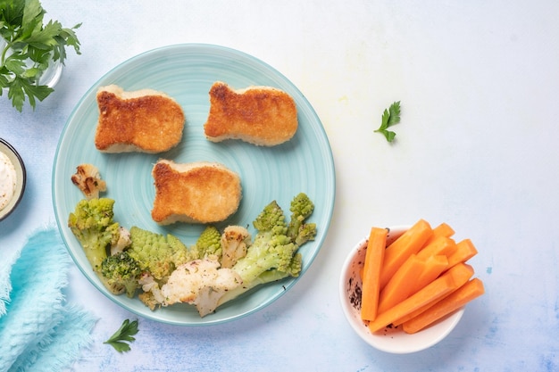 Kids food fish shaped nuggets with vegetable