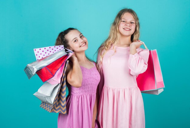 Kids go shopping gifts and presents buy purchase in shop shopper children happy childhood