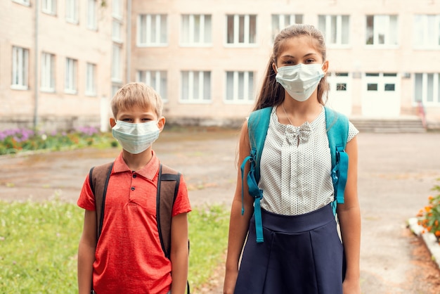 Kids going to school with a mask