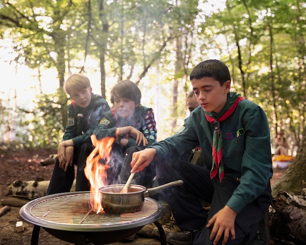 kids having fun as boy scouts
