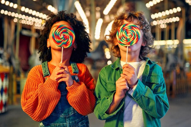 premium-photo-kids-having-fun-on-a-carnival-carousel