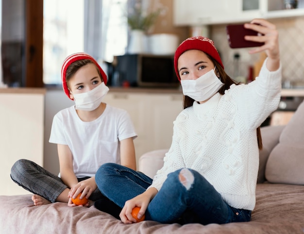 Kids at home with mask