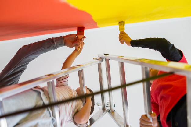 Photo kids painting new home