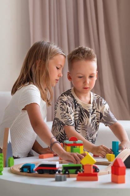 Photo kids playing around in calm and cosy spaces