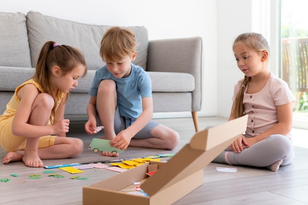 kids playing in living room full shot