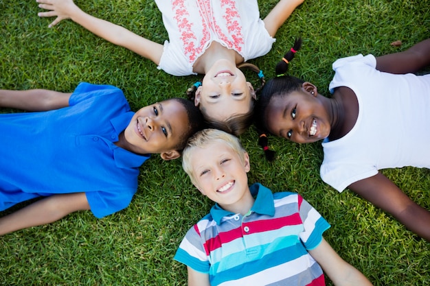 Kids posing together during a sunny day