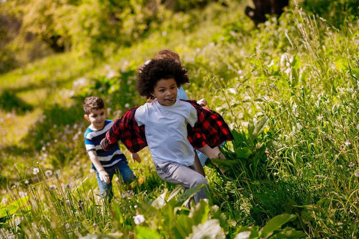 Kids running and playing in the park