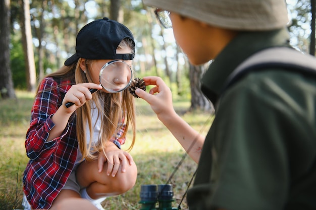 Kids scouts in the forest