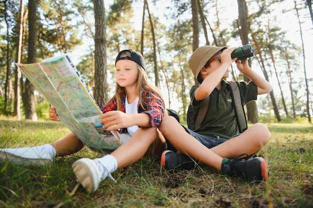 Kids scouts in the forest