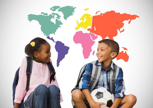 Kids sitting in front of colorful world map with football