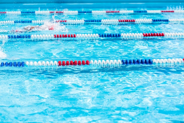 Kids swim meet in outdoor pool during the summer.