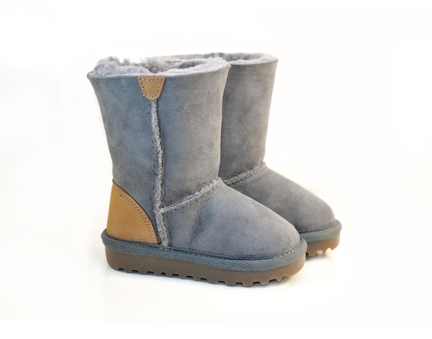 Kids warm winter boots in gray fur.