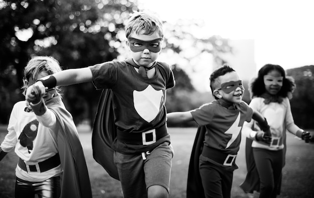 Kids Wear Superhero Costume Outdoors