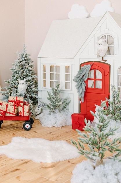 Kids wooden playhouse christmas decorations. Baby toys, Christmas gifts and playground.