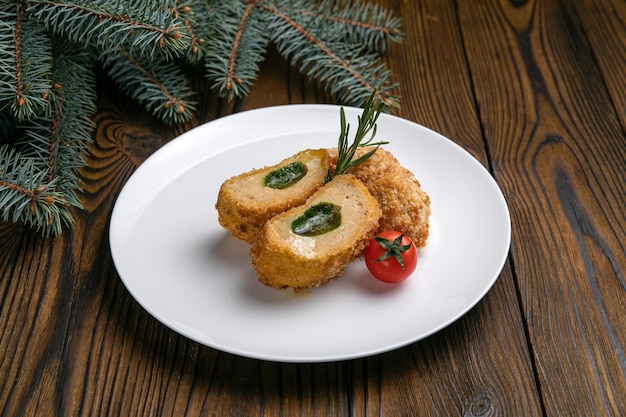 Kiev cutlet on a brown wooden table