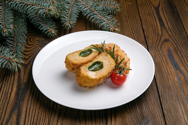 Kiev cutlet on a brown wooden table