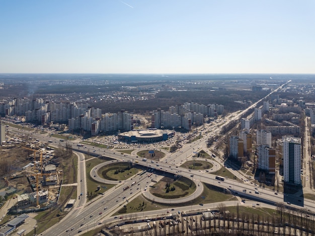 Kiev, Ukraine - April 7, 2018: aerial view roadway system in Kyiv, Odessa junction, with lots of cars on a sunny day. Drone photography