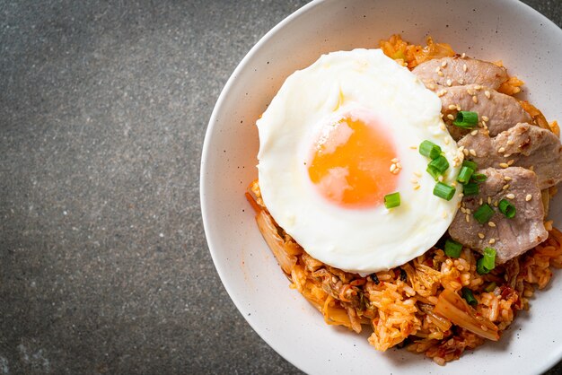 Kimchi fried rice with fried egg and pork