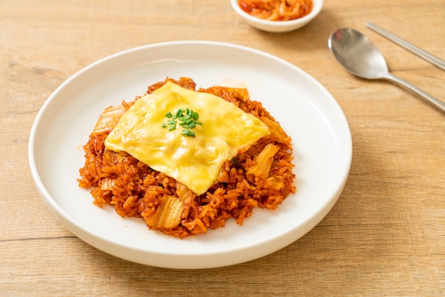 kimchi fried rice with pork and topped cheese - Asian and fusion food style