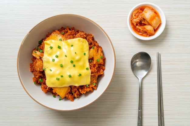 kimchi fried rice with pork and topped cheese - Asian and fusion food style