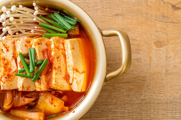 ‘kimchi jjigae’ or kimchi soup with soft tofu or korean kimchi\
stew - korean food traditional style