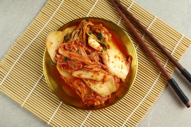 kimchi a staple in Korean cuisine is a traditional side dish of salted and fermented vegetable