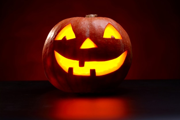 Kind Halloween Pumpkin On A Black Background