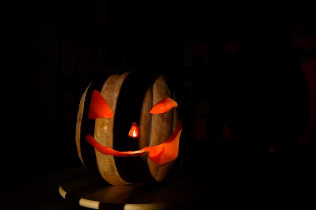 Kind Halloween Pumpkin On A Black Background