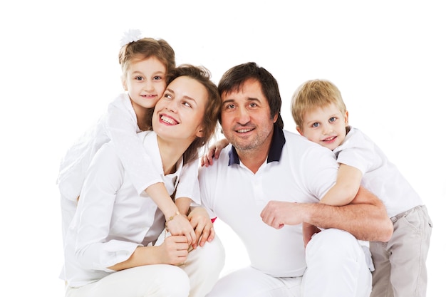 Kind, happy family relaxing at home.