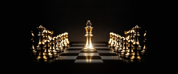 King chess piece stand on chessboard concepts of competition challenge of leader business team or teamwork volunteer or wining and leadership strategic plan and risk management or team player