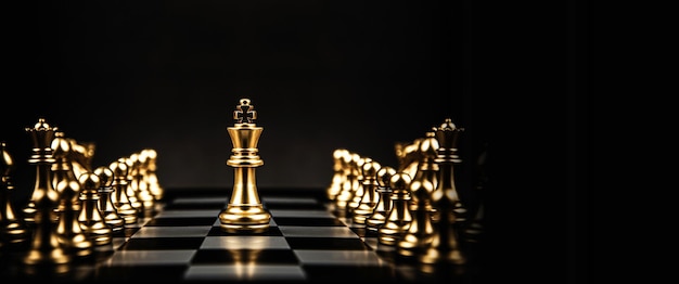 King chess stand on chessboard concepts of competition challenge of leader business team or teamwork volunteer or wining and leadership strategic plan and risk management or team player