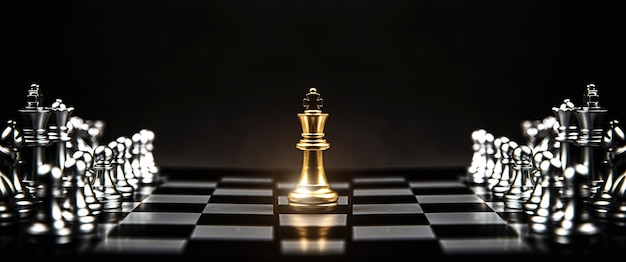 King chess stand on chessboard concepts of competition challenge of leader business team or teamwork volunteer or wining and leadership strategic plan and risk management or team player