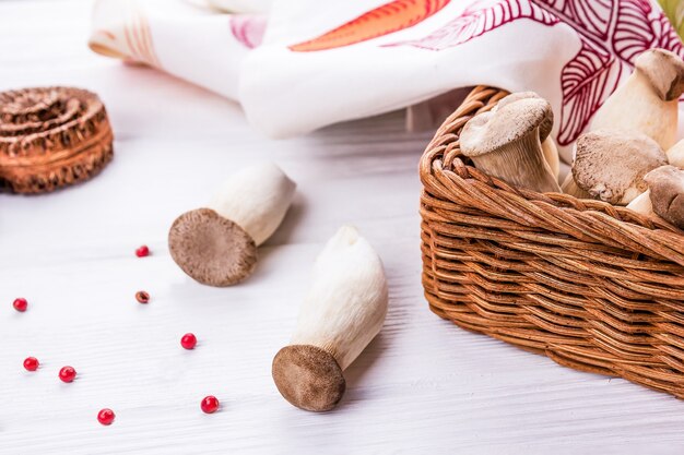 King oyster mushroom pleurotus eryngii on the wooden background