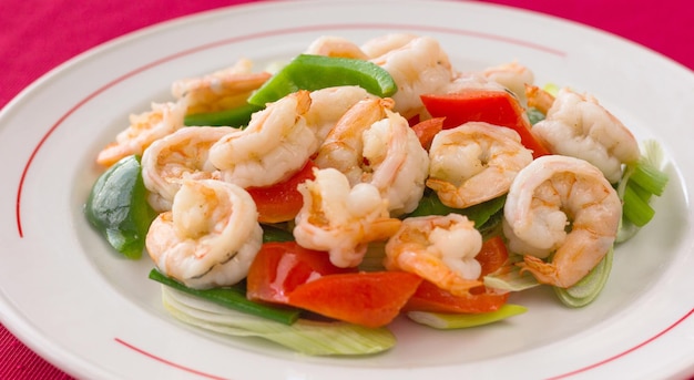 King prawns plate with onion, green and red bell peppers. chinese restaurant traditional food