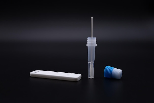 Kit for covid and disease testing on a black background