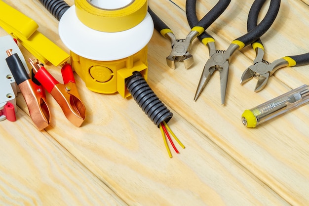 Kit spare parts and tools for electrical on wooden boards