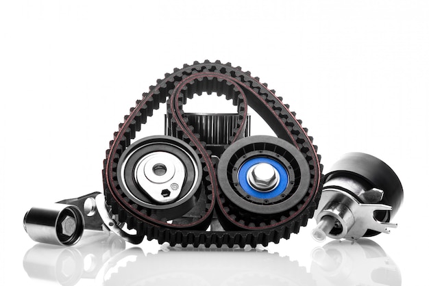 Photo kit of timing belt with rollers on a white wall