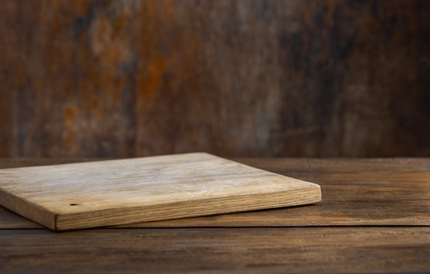 Kitchen background with empty cutting board for montage your object