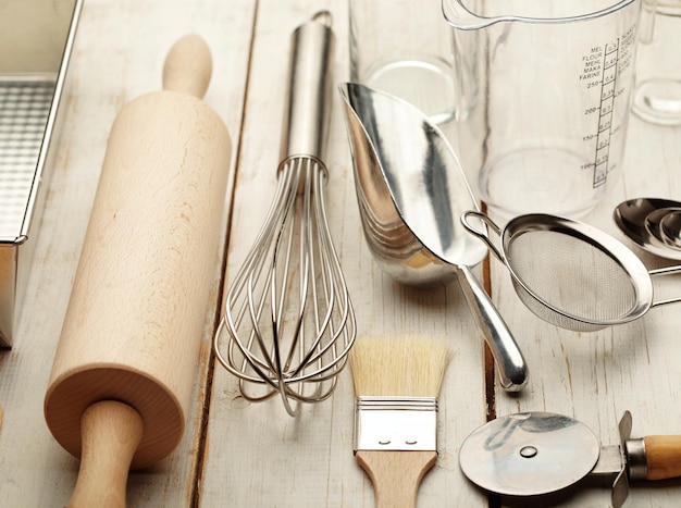 Kitchen baking utensils against white desk