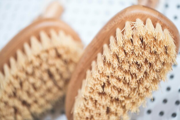 Kitchen brushes hang in supermarket