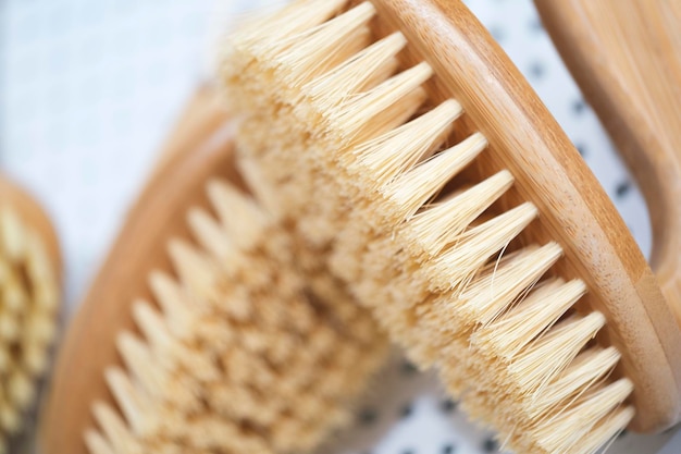 kitchen brushes hang in supermarket