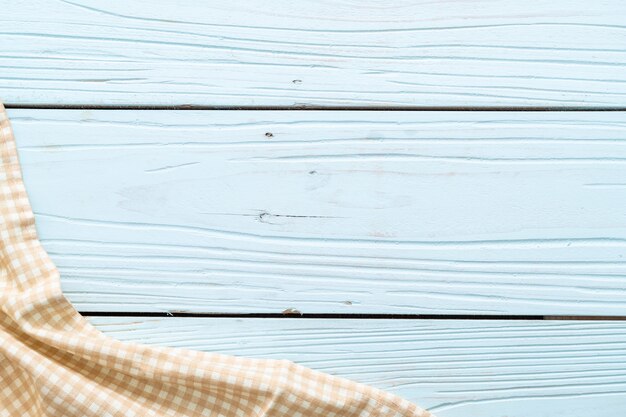 Foto panno da cucina (tovagliolo) sulla parete di legno blu