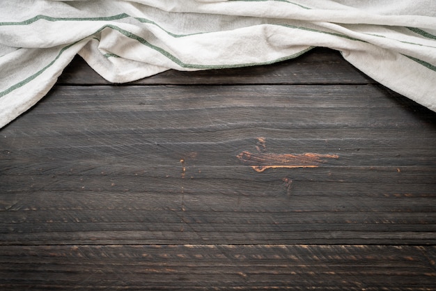 kitchen cloth (napkin) on wood background