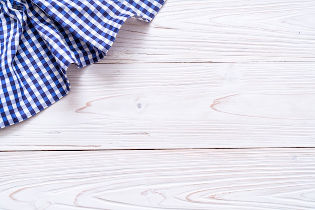 kitchen cloth (napkin) on wood background